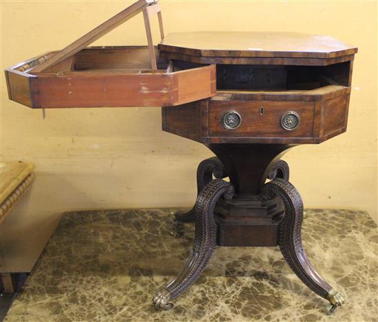 Regency mahogany writing table, on quadripartite base